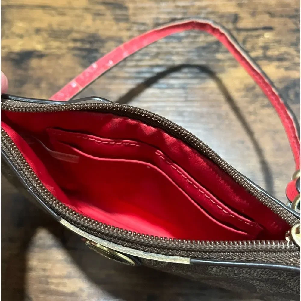 Coach wristlet with coral pink accents - Picture 3 of 6